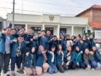 A group of people posing for a photo AI-generated content may be incorrect.