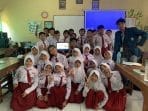 A group of children in uniform AI-generated content may be incorrect.