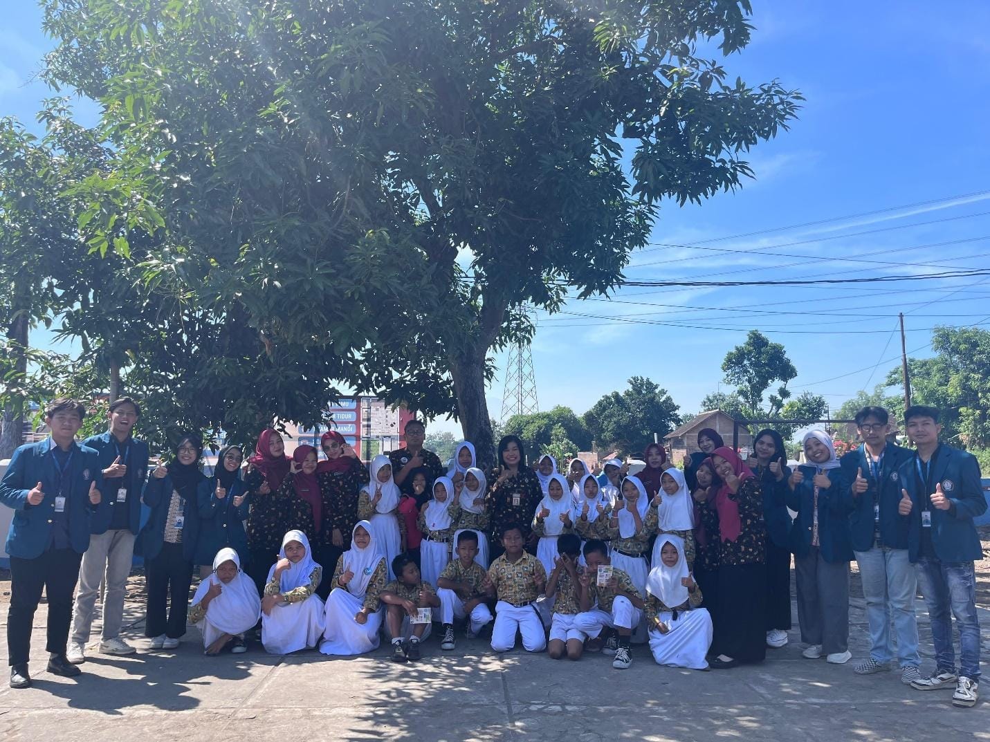 A group of people posing for a photo AI-generated content may be incorrect.