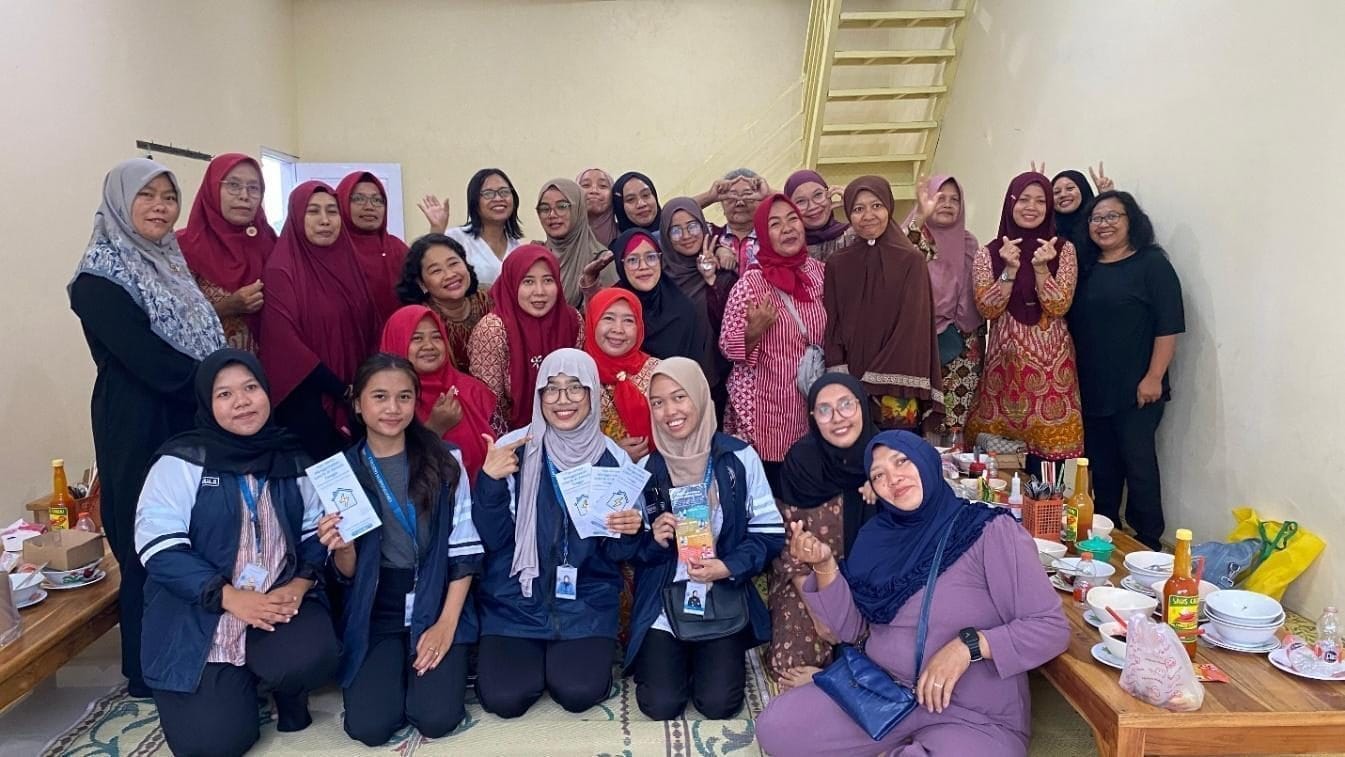 A group of women posing for a photoDescription automatically generated