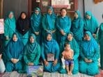 Mahasiswa KKN IDBU 22 UNDIP Kenalkan Brownies Mocaf untuk Diversifikasi Pangan A group of women in blue outfits posing for a photo AI-generated content may be incorrect.