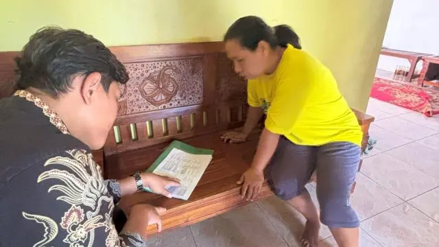 A person kneeling on a bench next to a person AI-generated content may be incorrect.