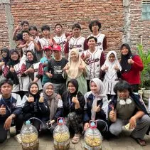 A group of people posing for a photo Description automatically generated