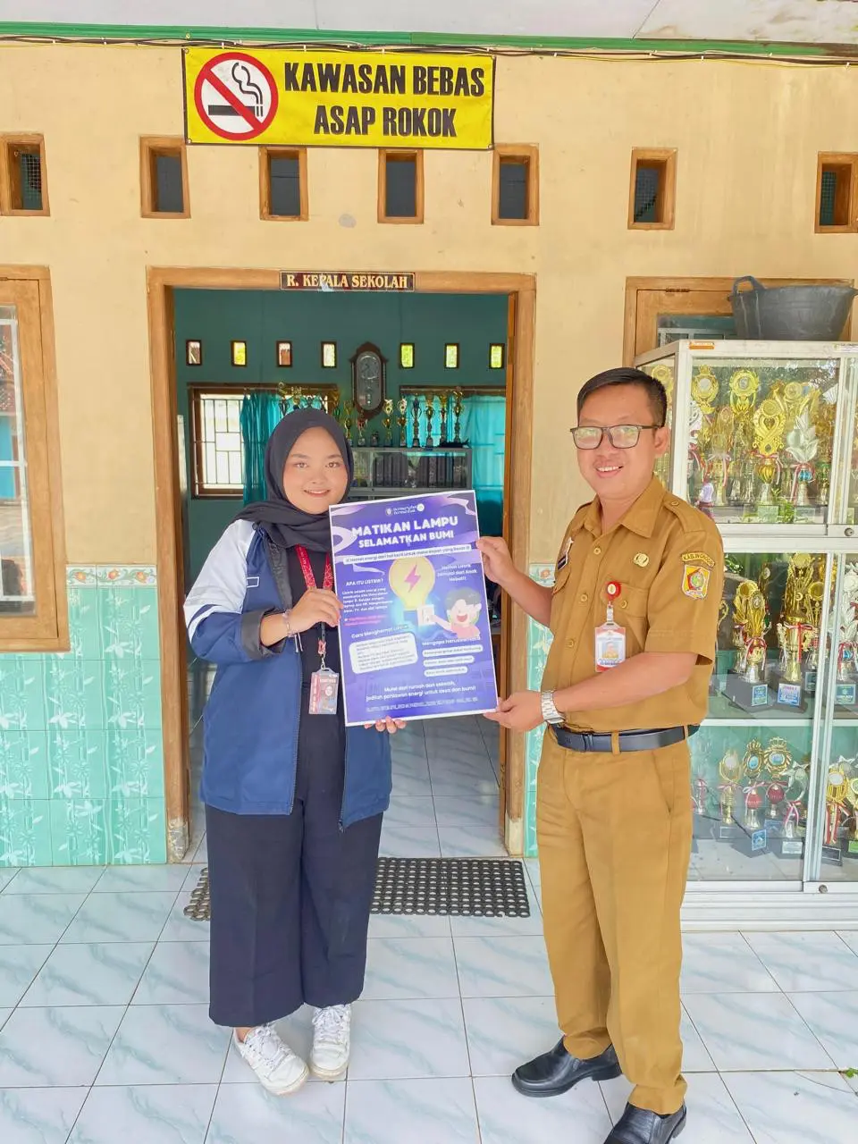 A person and person holding a poster AI-generated content may be incorrect.